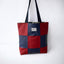 Bolso de mano reversible con cuadros rojos de Teresa