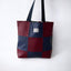 Bolso de mano reversible con cuadros en color Vino de Teresa