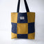 Bolso de mano reversible con cuadros amarillos de Teresa